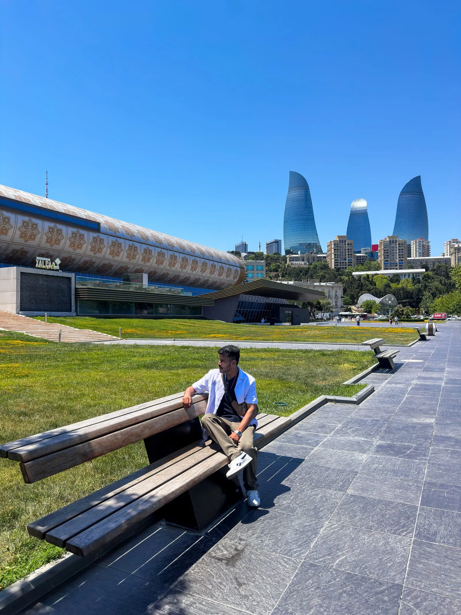 picture of me sitting next to mini venice in Baku